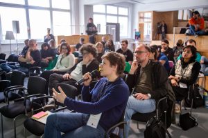 the audience of the main stage – the room is well filled and a Q&A session is in progress